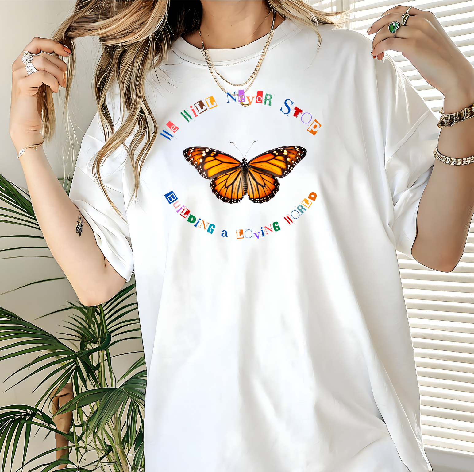 We Will Never Stop Building a Loving World - Unisex t-shirt