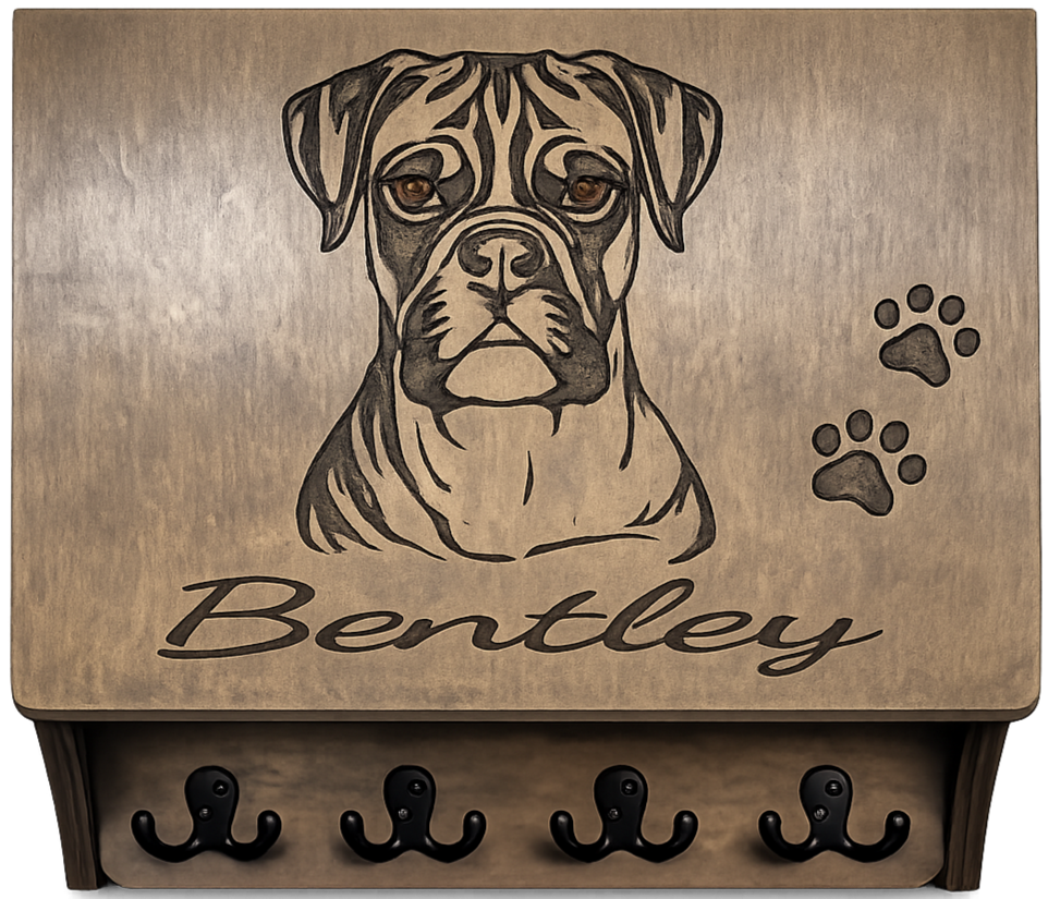 A wooden dog grooming or leash box with a carved image of a bulldog's face, including eyes with an amber hue, and paw prints on the right. The name "Bentley" is written in cursive below the dog illustration.