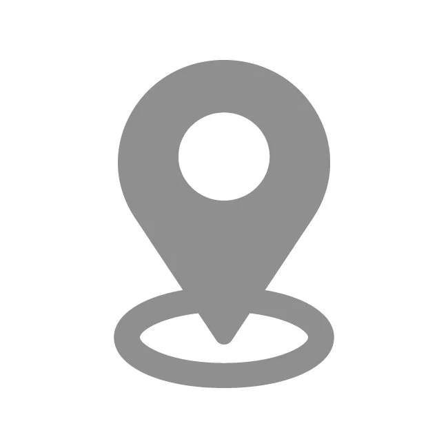 Location pin icon in grey.+
