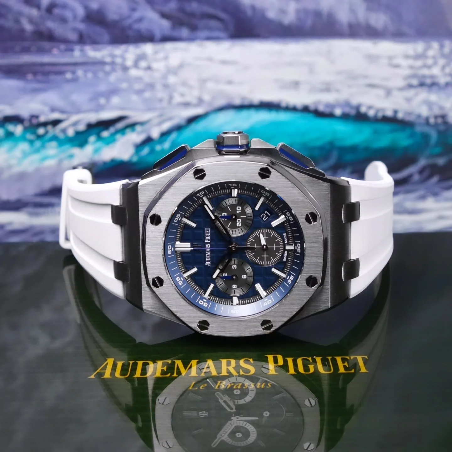 Blue dial, white and blue straps, titanium, excellent condition (with box and papers), and such neat subdials...dont miss this 26480TI!