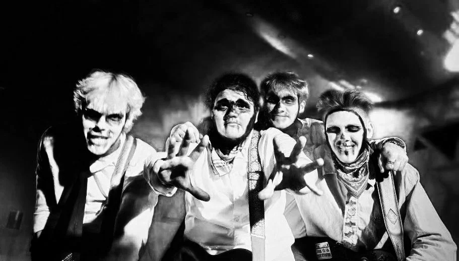 Mutt after performing at a school halloween festival, wearing selfmade skeleton makeup.