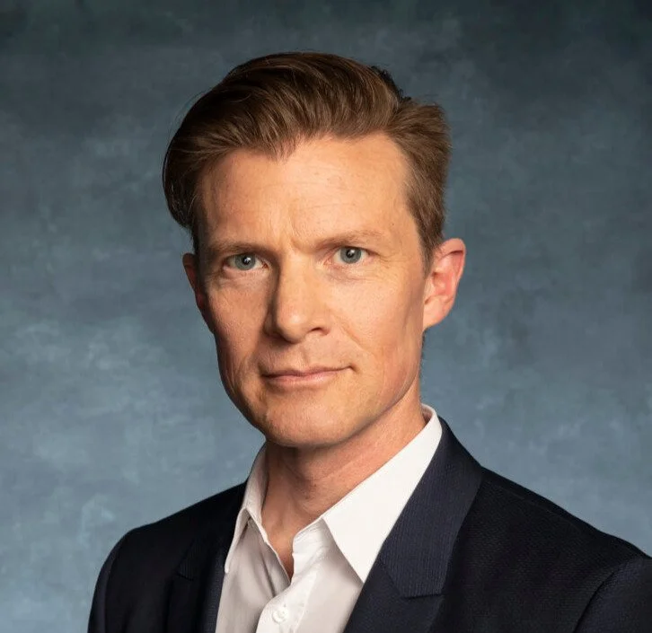 Headshot of Johan Norberg, author and global progress thinker, expert on freedom and long-term human outcomes, represented by 92 Speakers Bureau