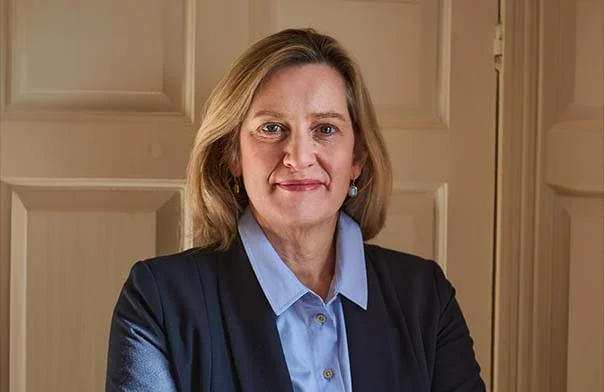 Amber Rudd keynote speaker headshot — former Home Secretary and leadership speaker