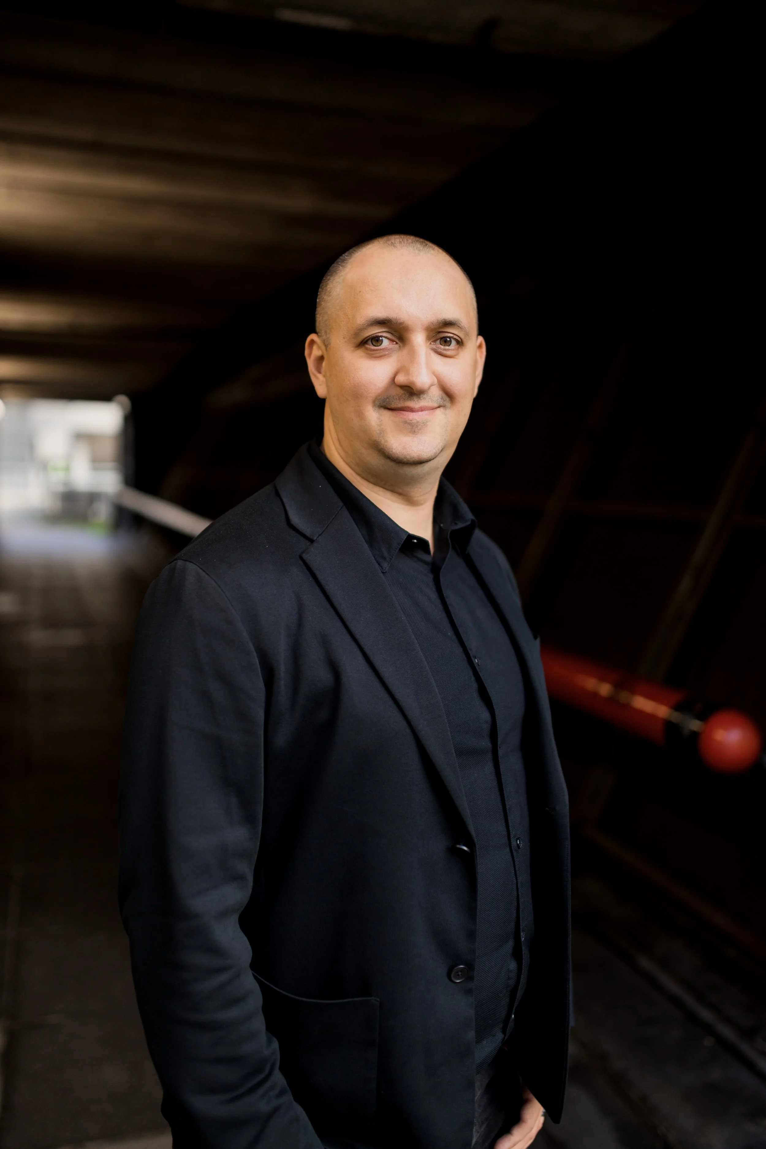 James Poulter headshot – AI adoption strategist, innovation operator and conversational technology keynote speaker