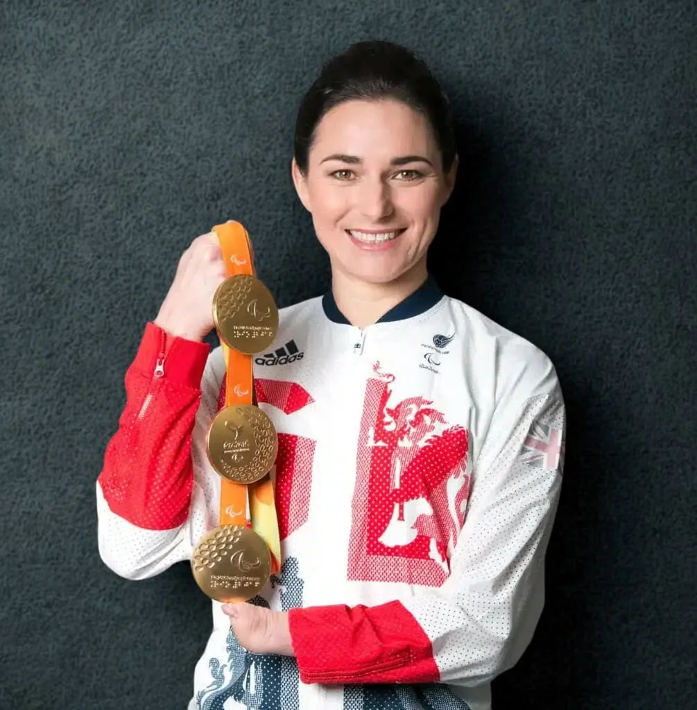 Dame Sarah Storey DBE, 19-time Paralympic gold medallist and Greater Manchester Active Travel Commissioner, on stage for 92 Speakers discussing high-performance mindsets and urban infrastructure.