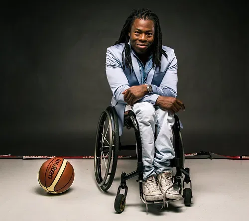 headshot Ade Adepitan | Paralympian, Broadcaster