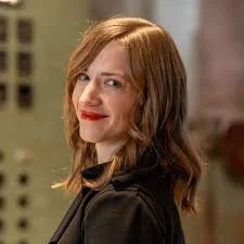 Headshot of Cassie Kozyrkov, decision intelligence pioneer and former Google Chief Decision Scientist