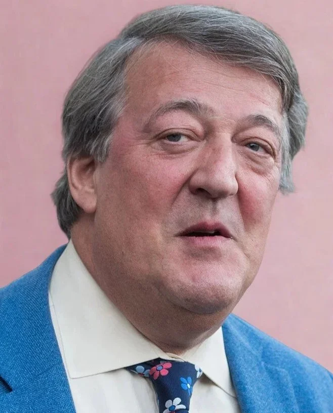 Sir Stephen Fry, author of "Odyssey" and creator of The Interrogator, on stage for 92 Speakers delivering keynotes on "The Boomer and the Doomer" and 2026 digital ethics.