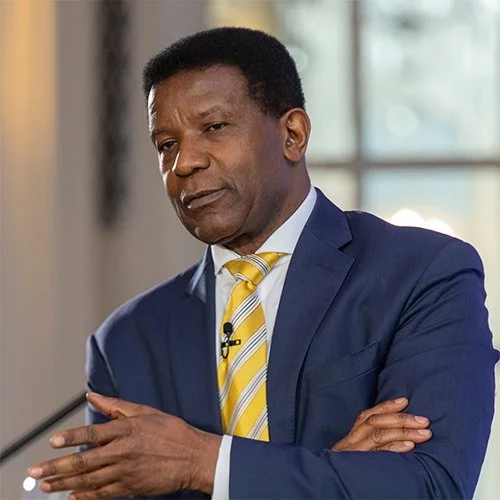 Headshot of Trevor Williams, economist and expert on macroeconomic risk, markets and strategic foresight