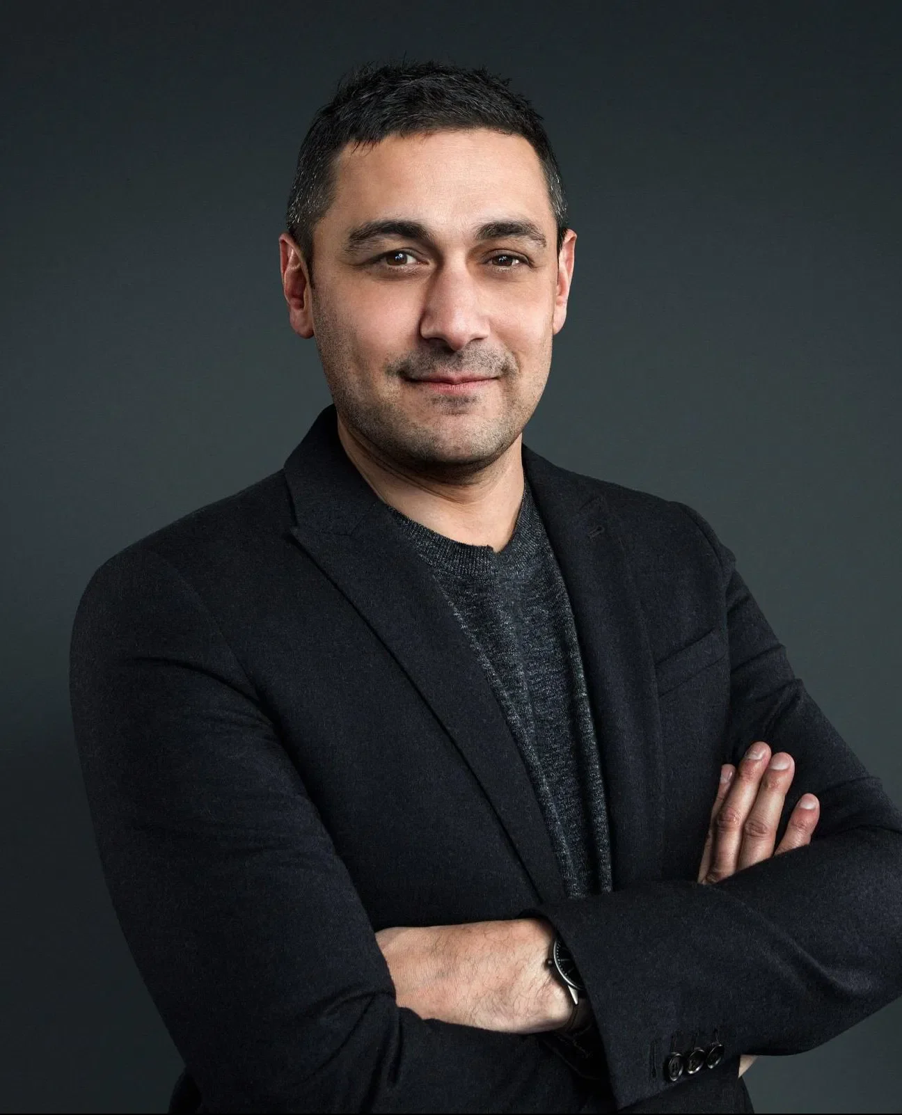 Adam Rutherford headshot, geneticist, author and keynote speaker