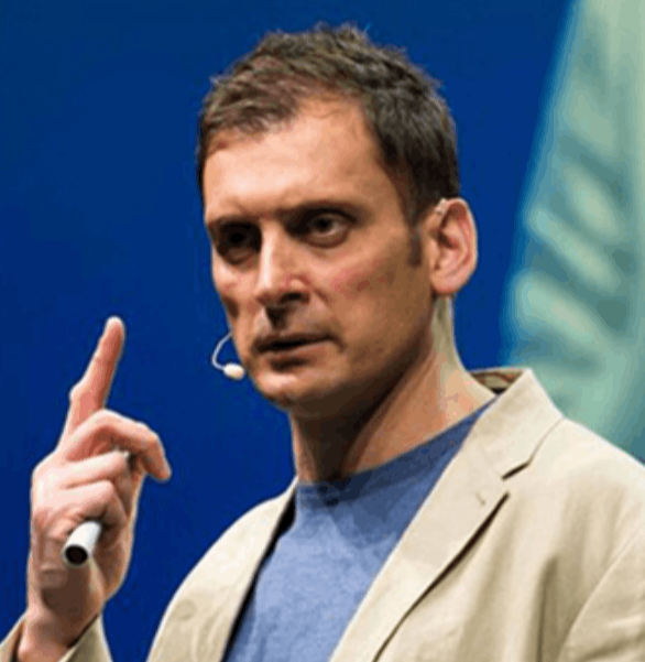 Jamil Qureshi, the first-ever official psychologist to the European Ryder Cup team and world-class performance coach, on stage for 92 Speakers delivering keynotes on thinking differently to achieve elite results.