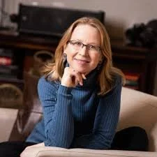 April Rinne headshot, future-of-work strategist and keynote speaker on adaptability, trust and new economic models