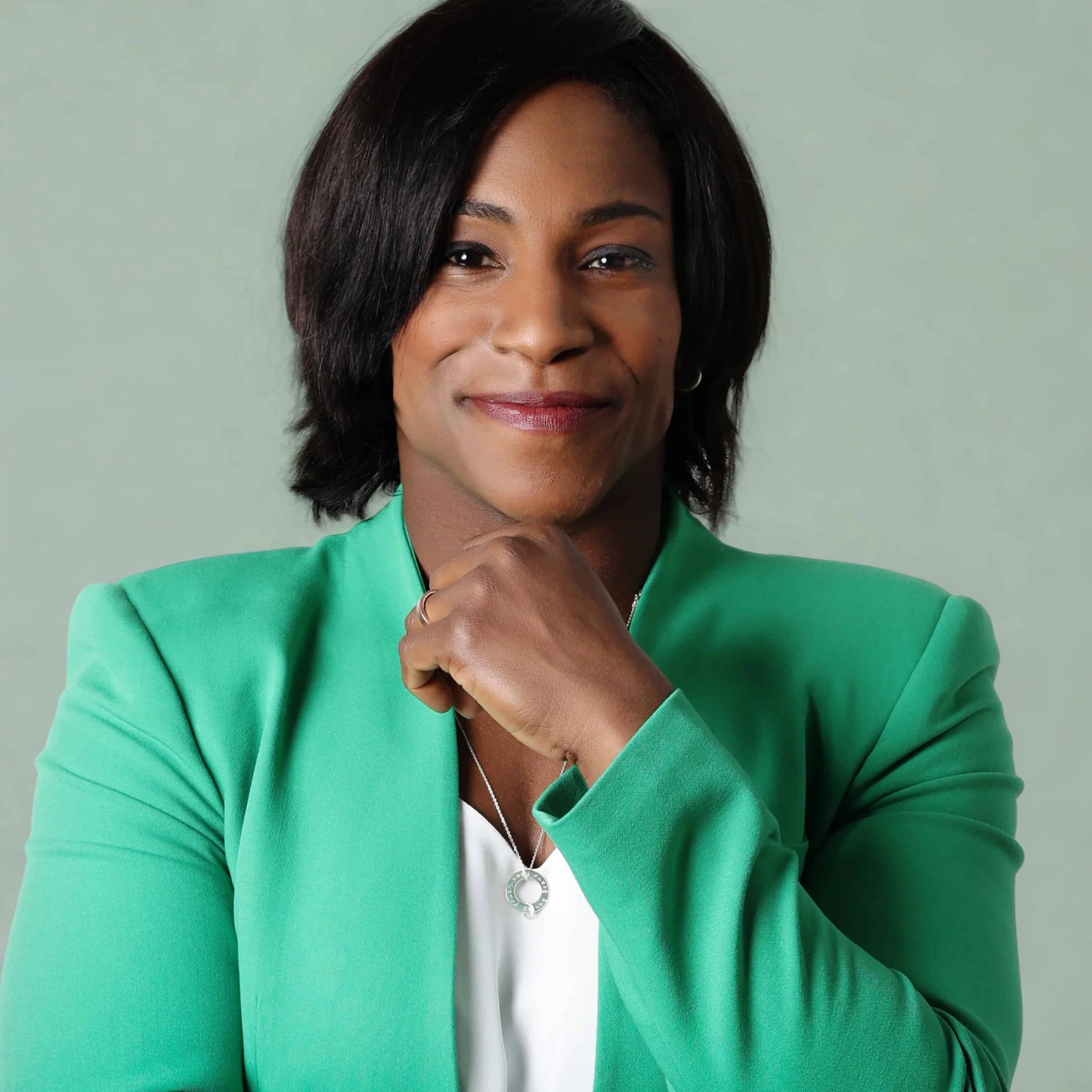 Maggie Alphonsi MBE, Rugby World Cup Champion and lead media analyst, on stage for 92 Speakers delivering keynotes on the psychology of the "Red Zone" and sustainable elite performance.