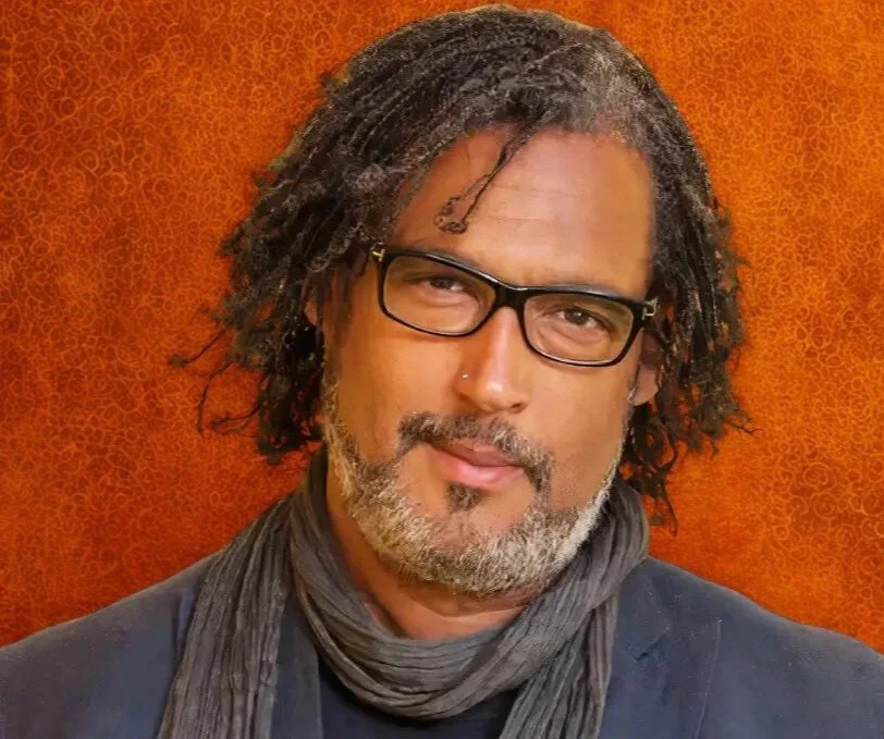 Professor David Olusoga, author of "Black and British" and "The Cult of Progress", on stage for 92 Speakers deconstructing the "Anatomy of Identity" and the 2026 shift in corporate heritage.