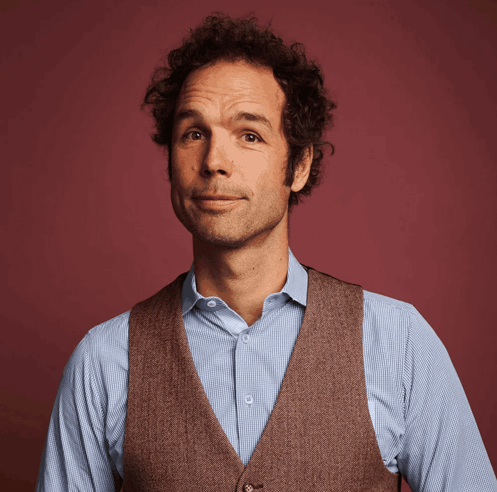 Thimon de Jong, global futurist and founder of Whetston, delivering a dynamic 2026 keynote on the intersection of AI, human psychology, and trust.