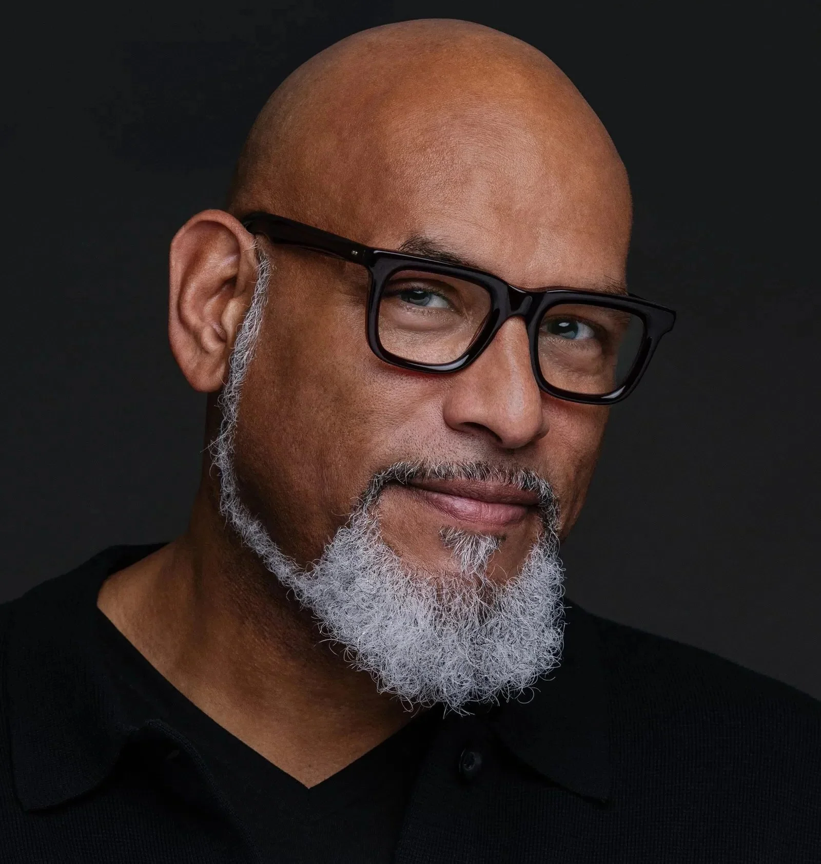 John Amaechi OBE, founder of APS Intelligence, delivering a 2026 keynote for 92 Speakers on the psychology of leadership and high-performance culture.