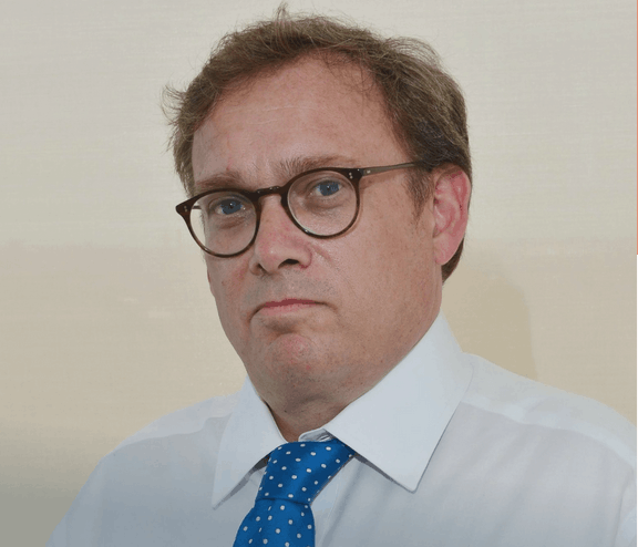 Adrian Wooldridge headshot — Bloomberg editor and keynote speaker on capitalism and institutions