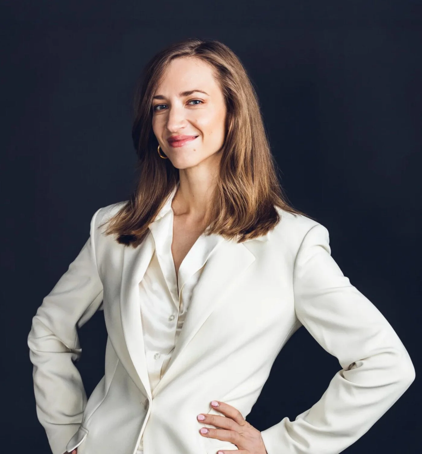 Headshot of Cassie Kozyrkov, decision intelligence pioneer and former Google Chief Decision Scientist