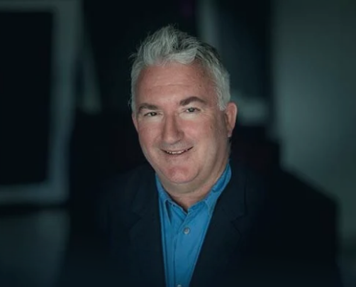 Headshot of James Kerr, culture and high-performance leadership keynote speaker,