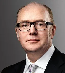 Headshot of Gerard Lyons, economist and expert on global markets, policy risk and strategic economic direction