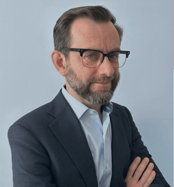 Andrew Edgecliffe-Johnson, Semafor CEO Editor and former FT editor, moderating high-level executive panel on corporate purpose and global markets