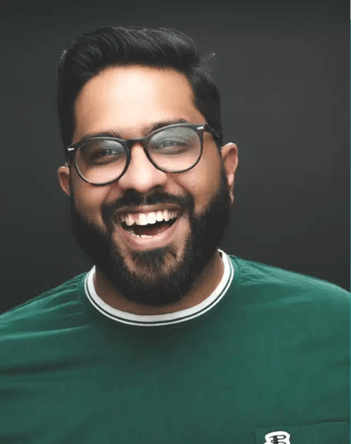 Eshaan Akbar keynote speaker headshot — stand-up comedian and writer