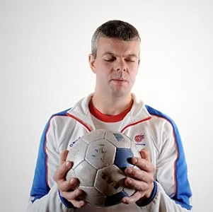 Headshot of David Clarke, Paralympic football legend and Chief Executive of Paralympics GB, speaking on inclusive leadership and high-performance culture, represented by 92 Speakers Bureau
