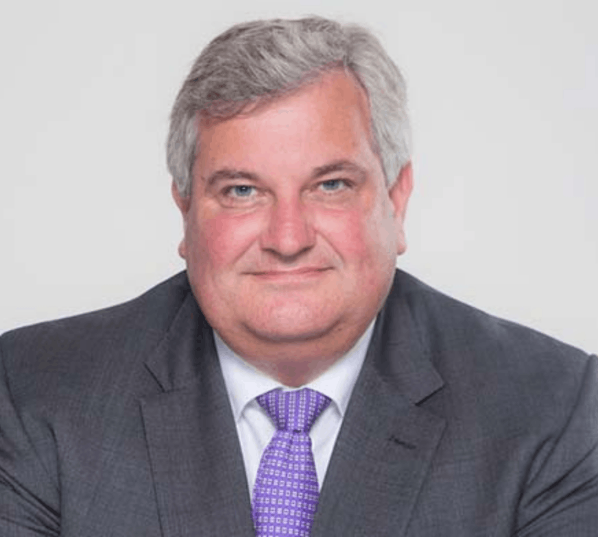 Headshot of Lord Mark Price, business leader on ownership, work, and organisational responsibility,