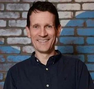 Bruce Daisley, workplace culture visionary and author of Fortitude, delivering a 2026 keynote for 92 Speakers on psychological safety and team resilience.