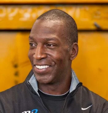 Michael Johnson headshot — Olympic champion and keynote speaker on excellence, performance and mindset | 92 Speakers