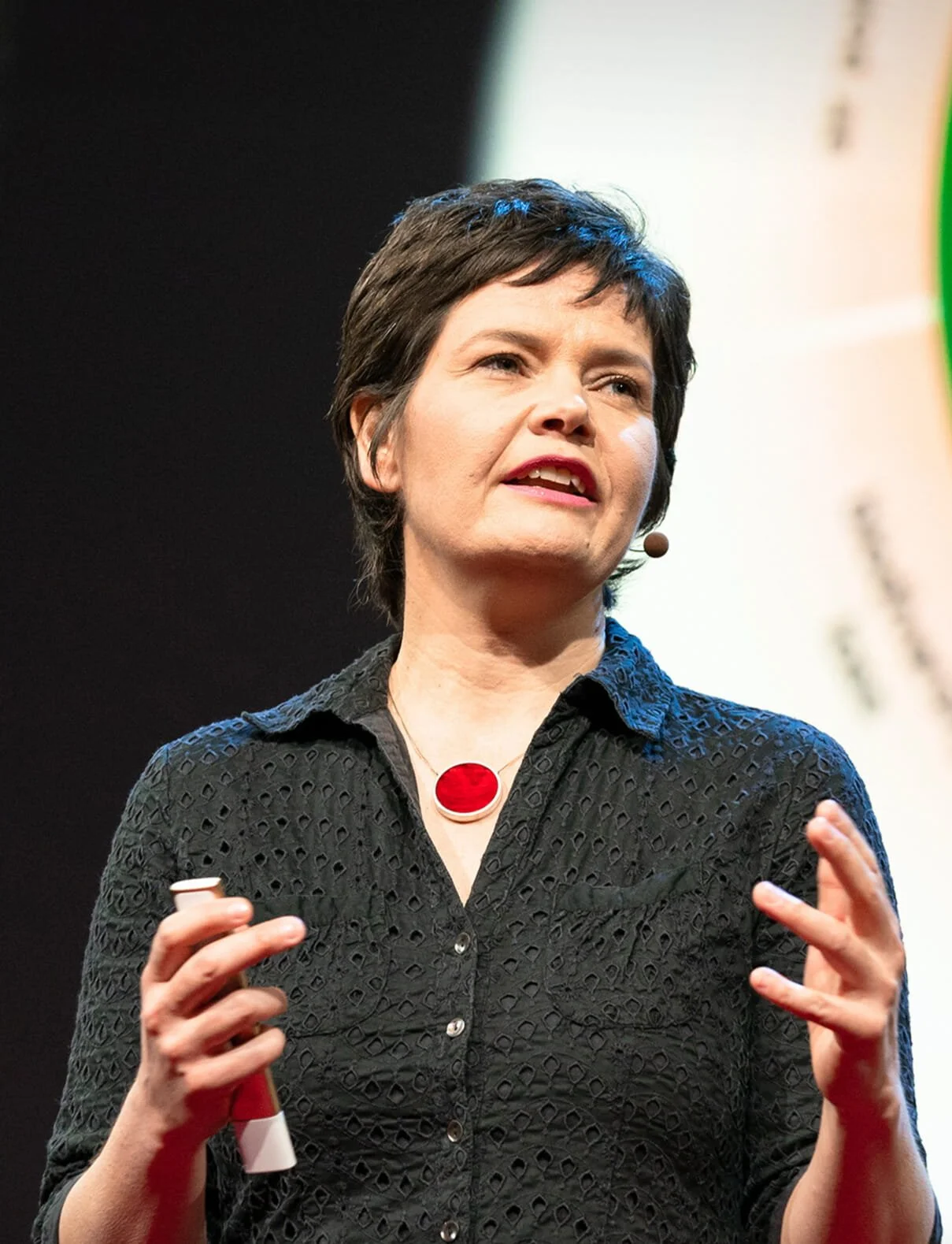 Headshot of Kate Raworth, economist and creator of Doughnut Economics, expert on sustainable growth and economic systems