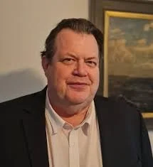 Headshot of Gerald Ashley, former banker and expert on risk, uncertainty and decision-making in complex systems