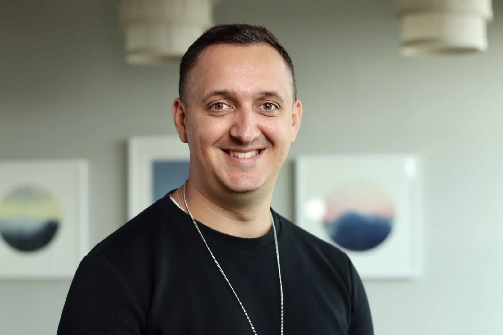 James Poulter headshot – AI adoption strategist, innovation operator and conversational technology keynote speaker