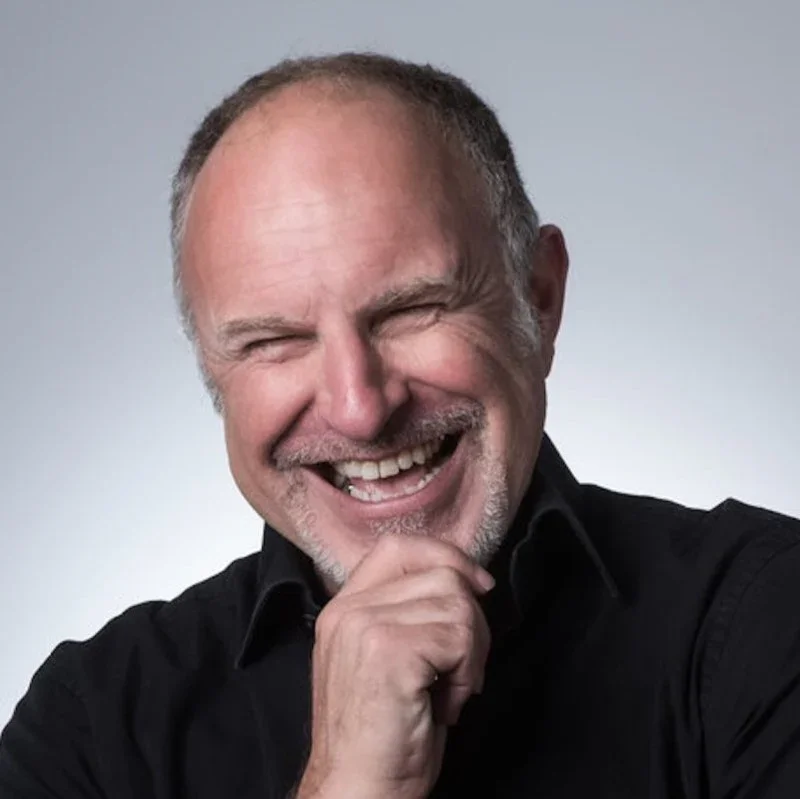 Simon Evans keynote speaker headshot — stand-up comedian and corporate entertainer