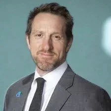 Will Greenwood MBE, England Rugby World Cup winner and elite performance coach, on stage for 92 Speakers deconstructing the psychology of winning and the "Three Pillars of Team Success."