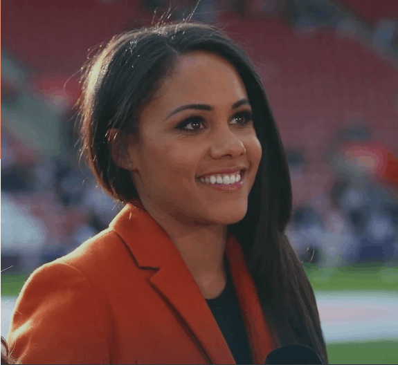 Alex Scott MBE, BBC Football Focus presenter and former England defender, delivering a 2026 keynote on resilience and diversity in sports broadcasting