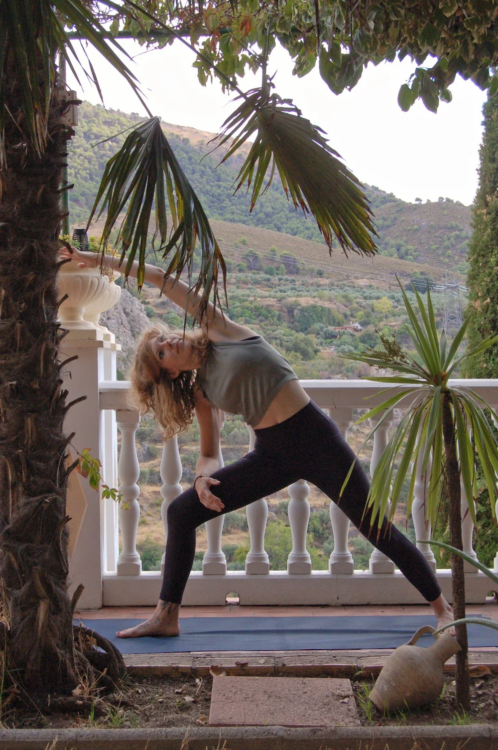 Yoga teacher showing her students a classic yoga pose