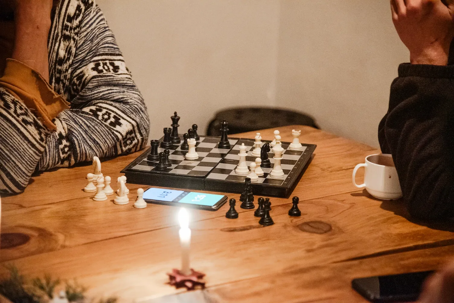 Two people playing chess during a yoga retreat
