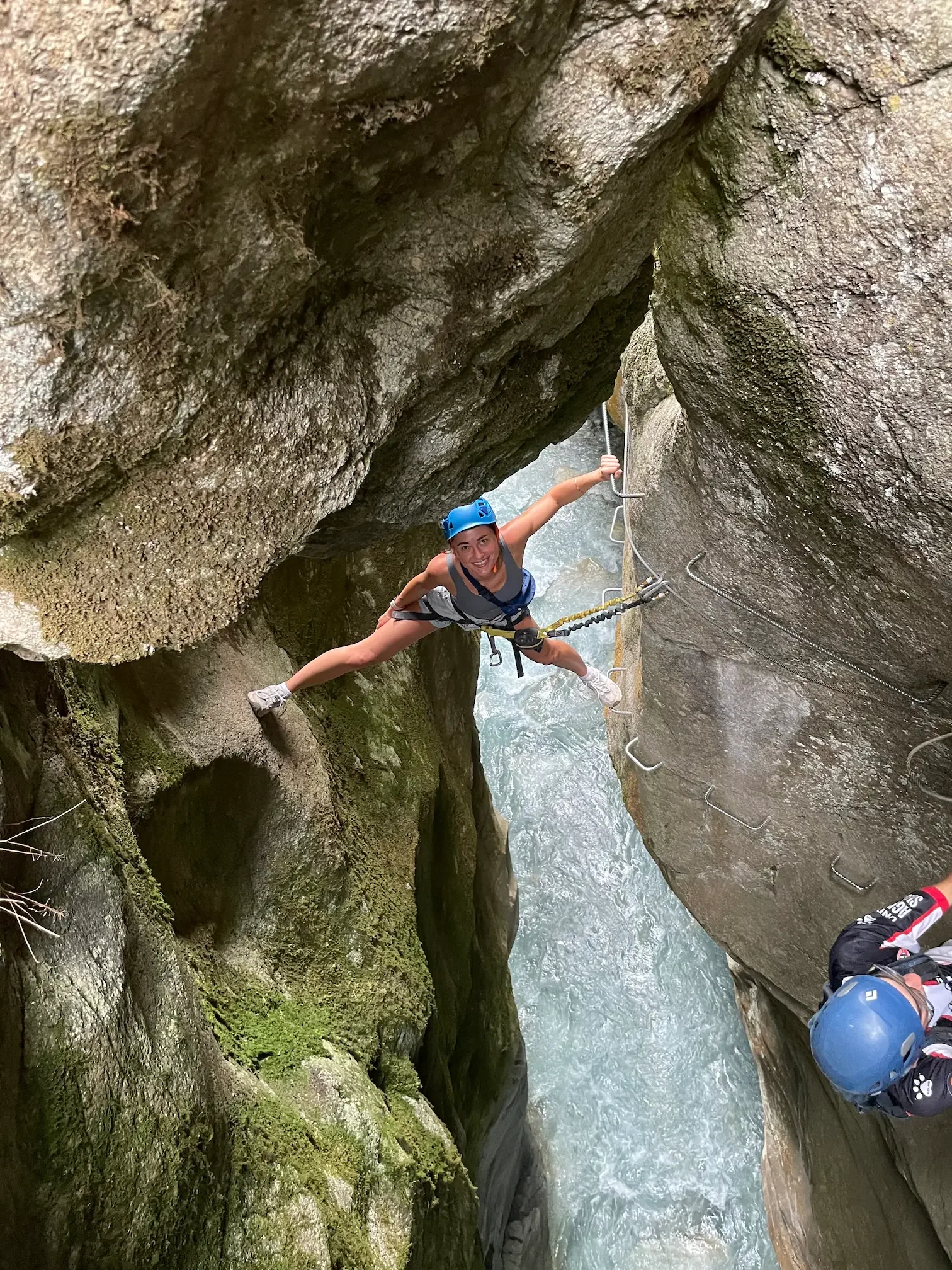 Girl smiling, having fun in a via ferrata around granada
