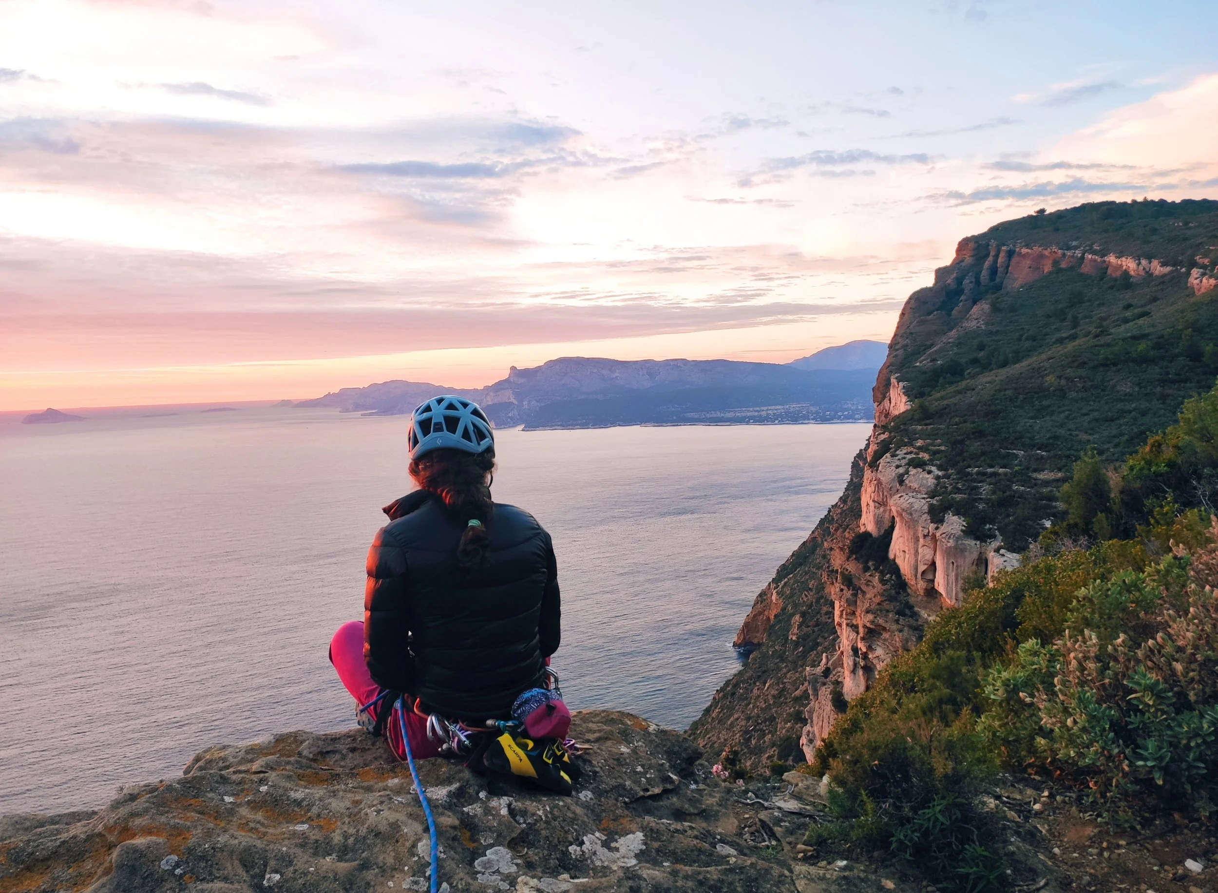 A girl is admiring a beautiful sunset in Costa Tropical, Andalusia