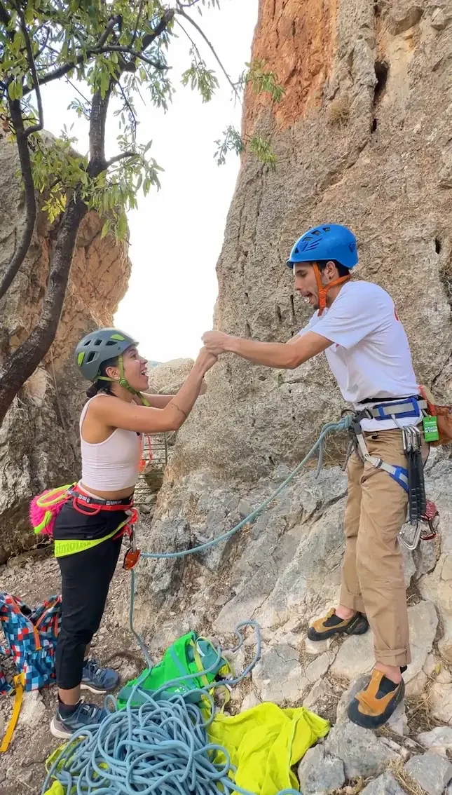 Climber enjoying his first outdoor rock climbing course in Granada