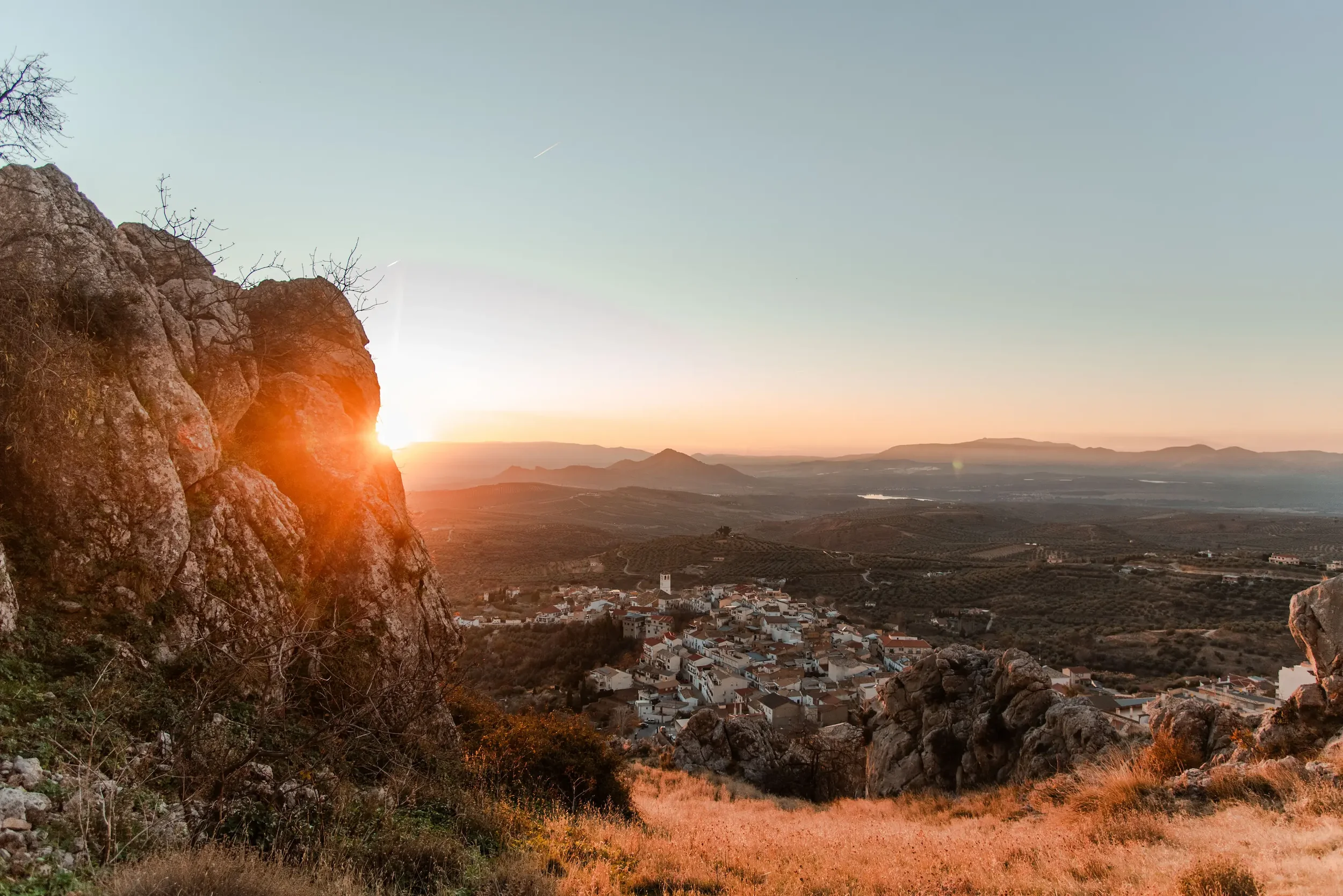 Panoramic view on limestone rock in Cogollos de la Vega with a climber in the background