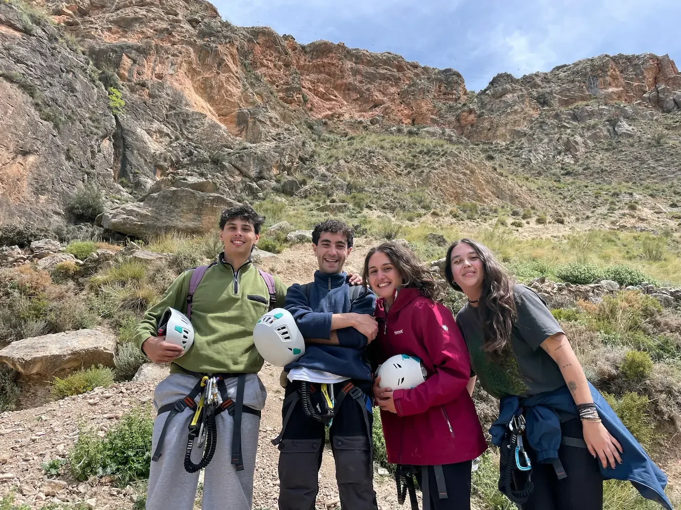 Group picture of 4 spanish young students after finishing the via ferrata la Araña