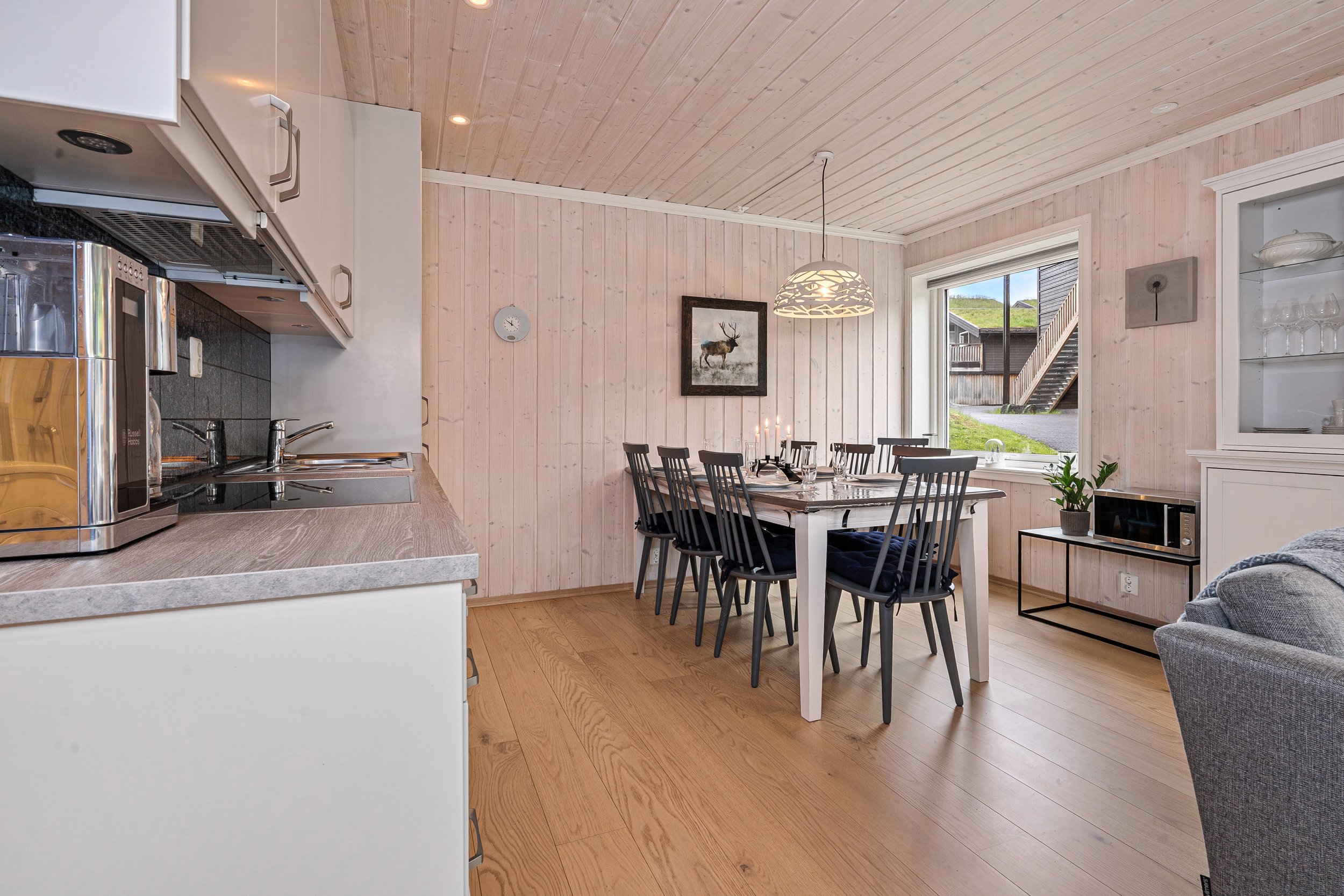 Bright kitchen with dining table. Photo