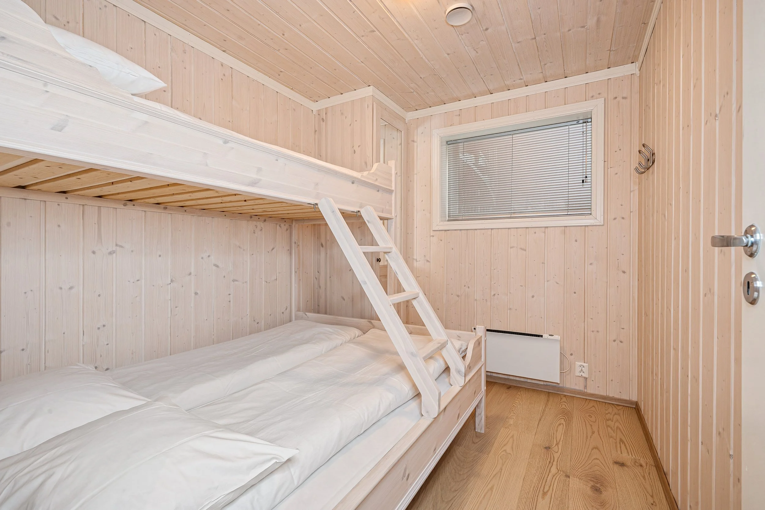 Bright bedroom with family bunk bed. Photo