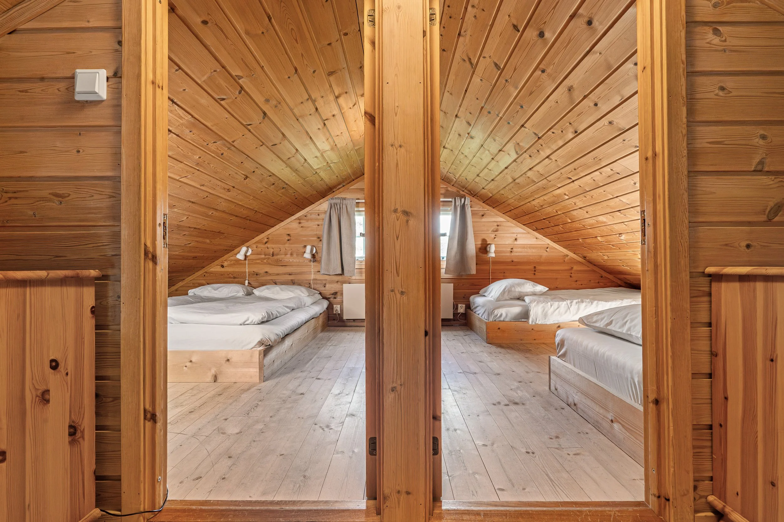 Doorway to two separate bedrooms on the loft. Photo
