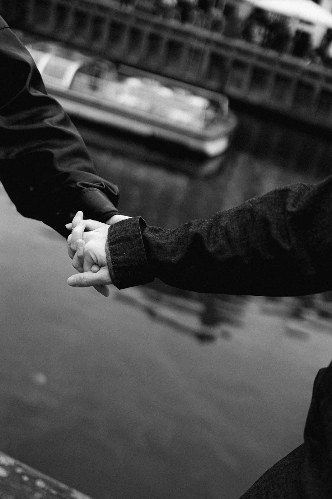 wedding couple's hands detail shot in Nyhavn copenhagen denmark.jpg