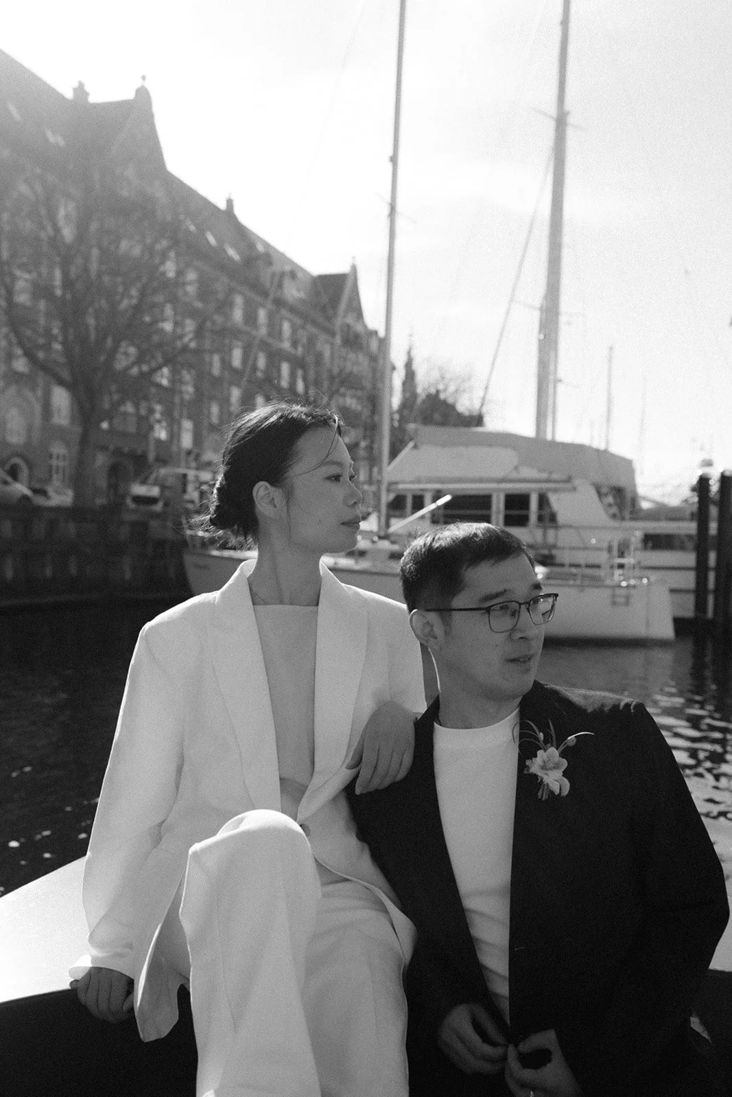 Couple portrait on goboat black and white in canal of Copenhagen denmark.jpg