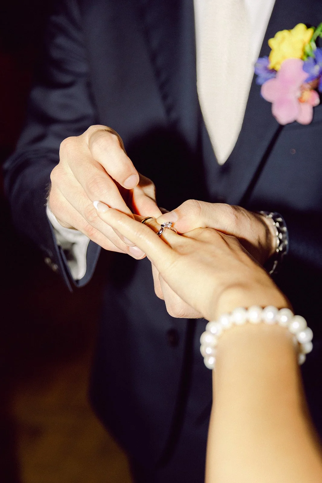 Bride and groom exchange rings in copenhagen city hall after getting married in denmark.jpg