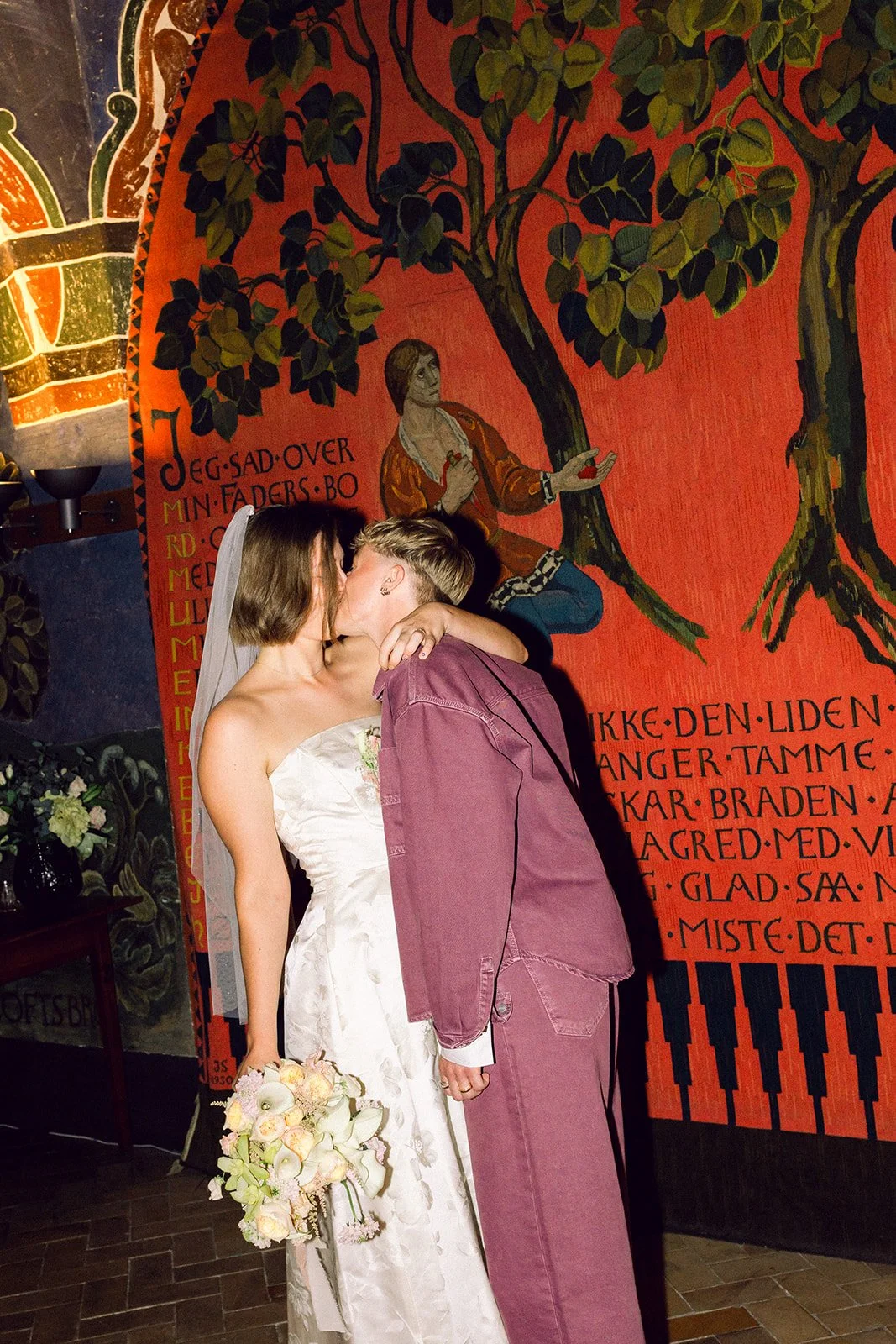 LGBTQ+ couple kissing in copenhagen city hall after getting married in denmark registration.jpg.jpg